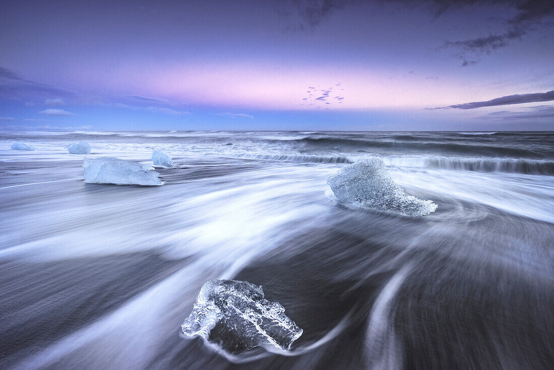 Jokulsarlon, East Iceland, Iceland. Ice formations on the beach at sunrise.