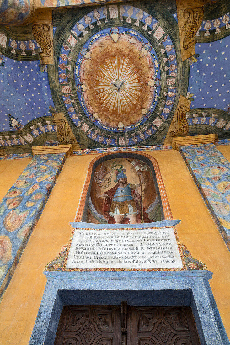 Grana Valley (Valle Grana), Castelmagno, province of Cuneo, Piedmont, Italy. Saint Magnus of Cuneo Sanctuary, frescoed facade