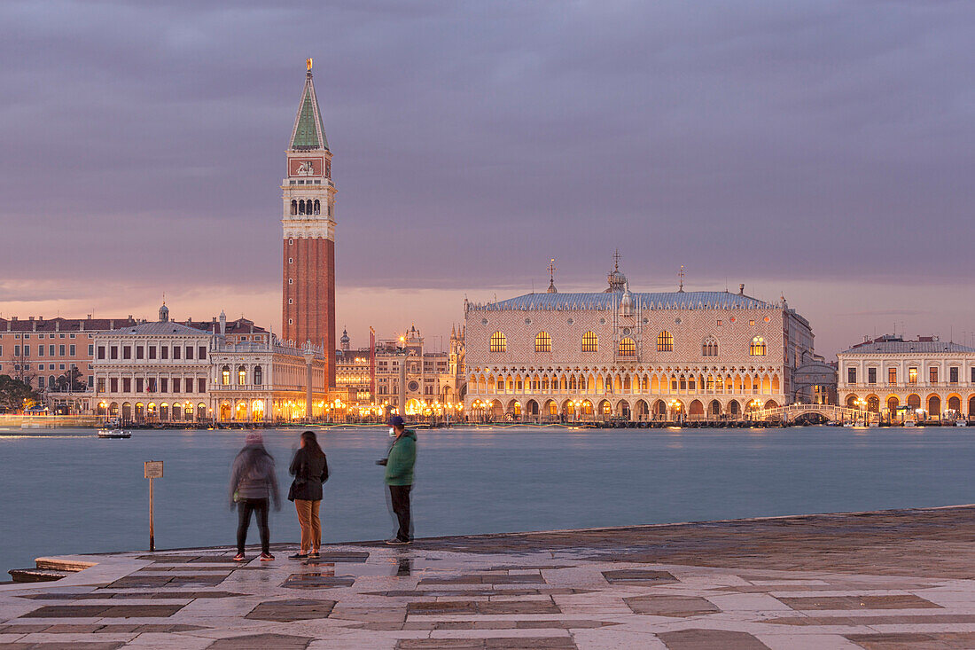 Tourists at San Giorgio Island, in front of San Marco, Venice, Veneto, Italy