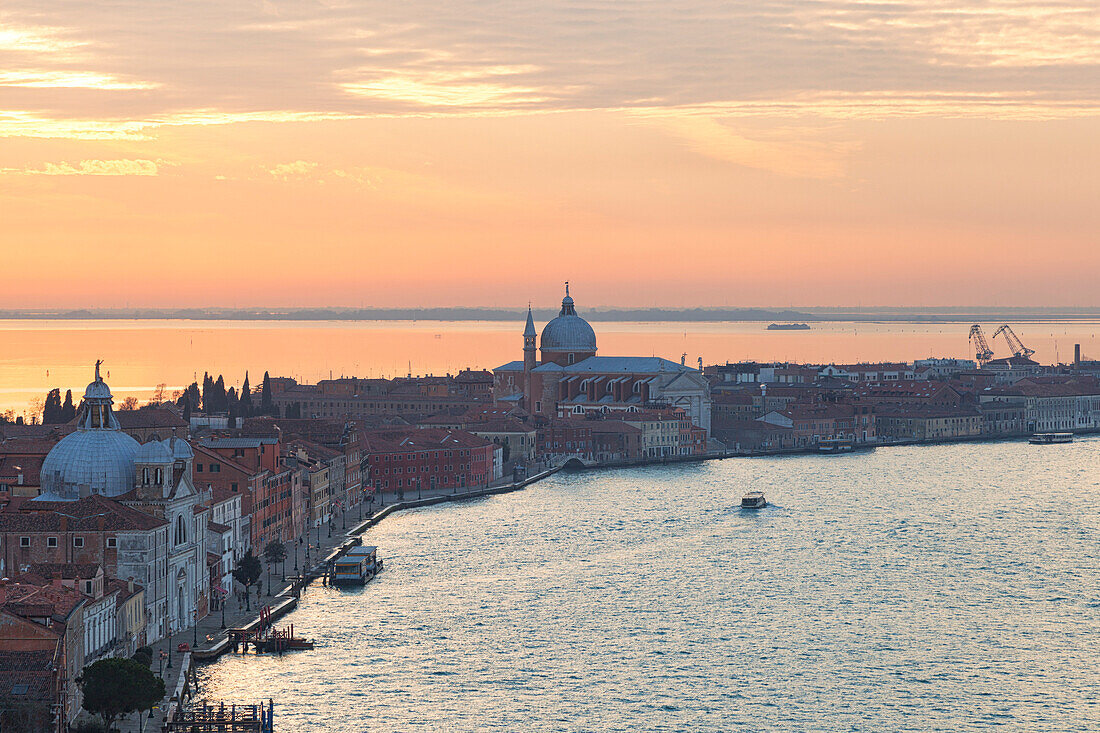 Sunset on Giudecca Island from the bell tower of San Giorgo Maggiore, Venice, Veneto, Italy.