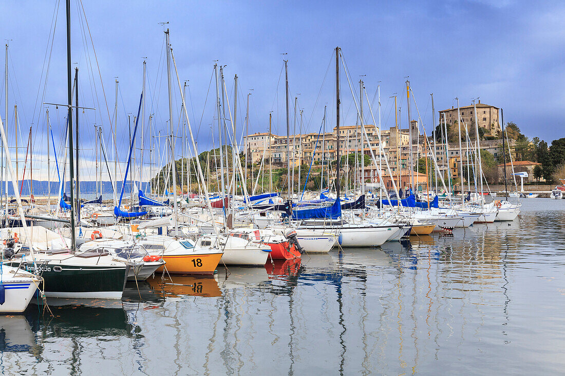 Capodimonte tourist port with black clouds in the sky. Capodimonte, Bolsena Lake, Viterbo province, Lazio, Italy