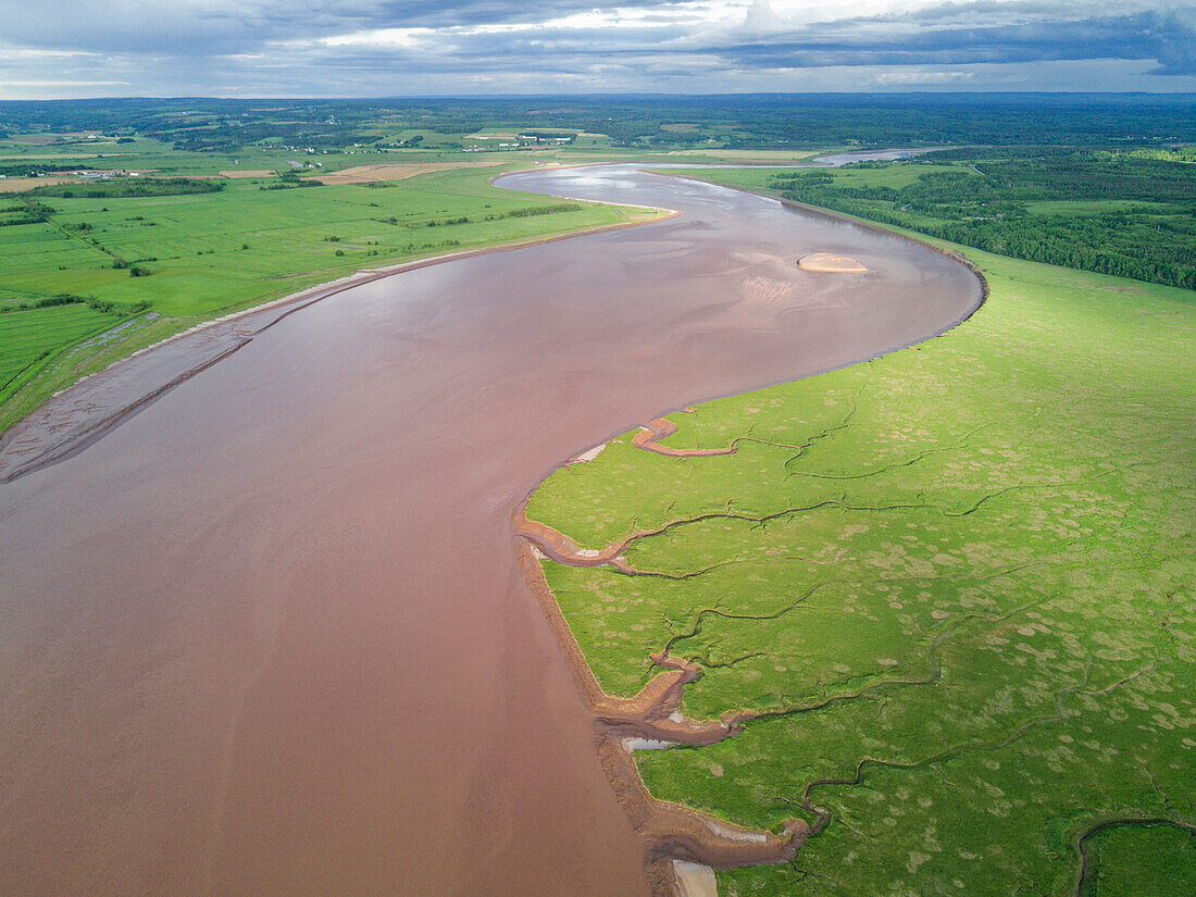 Maccan River estuary along dike and saltmarsh, Chignecto Bay, Nova Scotia, Canada