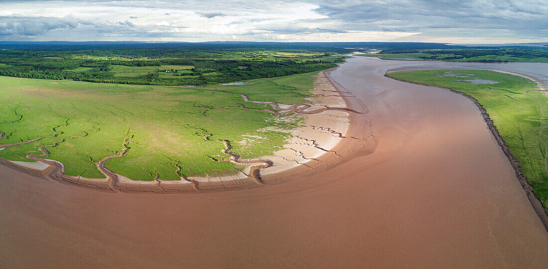 Maccan River estuary along dike and saltmarsh, Chignecto Bay, Nova Scotia, Canada