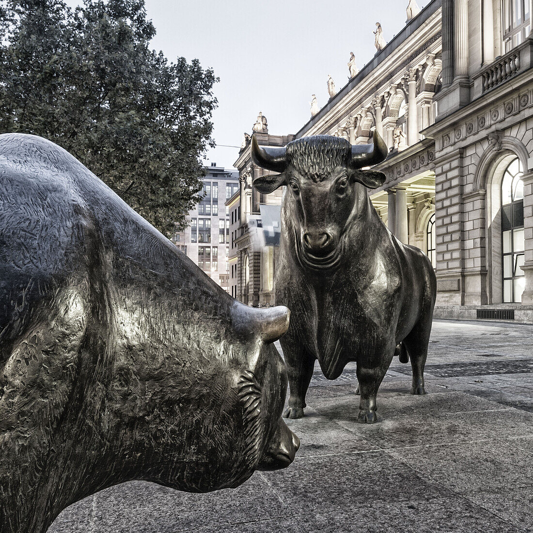 Germany, Frankfurt, bull and bear in front of stock exchange,  , twilight