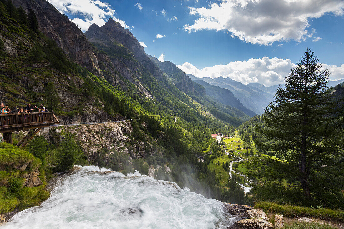View of the jump of Cascata del Toce waterfall and Formazza Valley in summer. Frua hamlet, Formazza, Valle Formazza, Verbano Cusio Ossola, Piedmont, Italy.