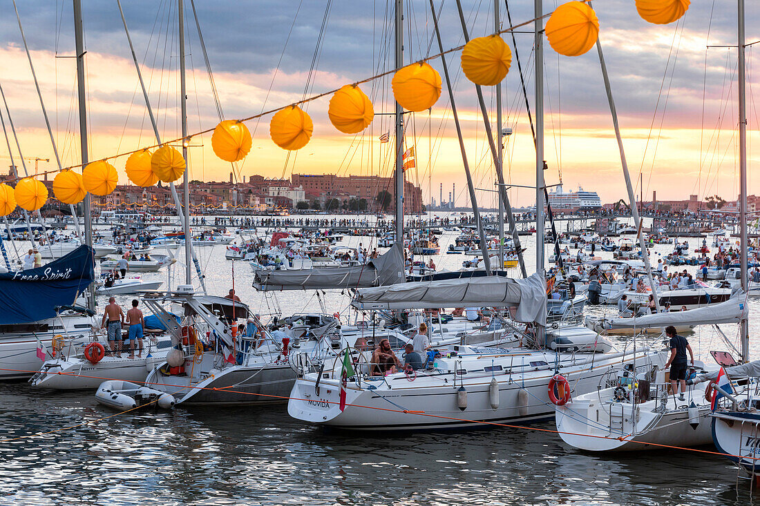 Giudecca Canal during Redentore (Redeemer) Feast with Votive Bridge in the background. Venice, Veneto, Italy, Europe.