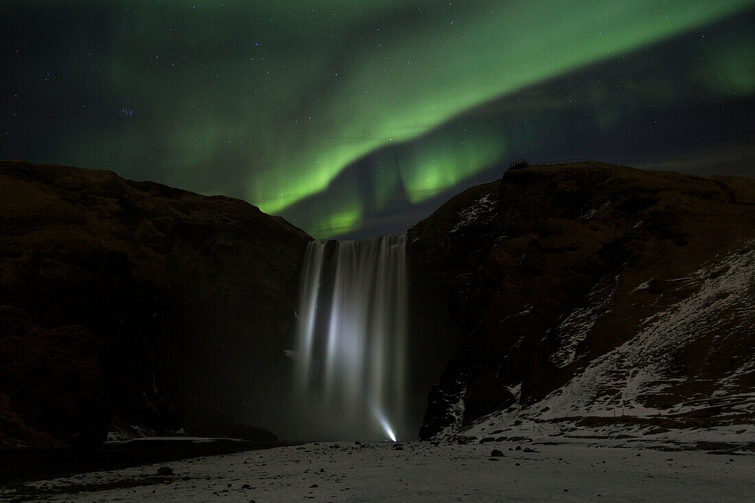 Northern lights above Skogafoss, Skogar, Iceland