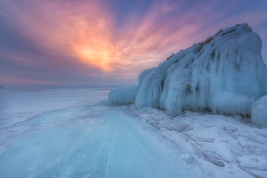 Ice mountain at sunrise at lake Baikal, Irkutsk region, Siberia, Russia
