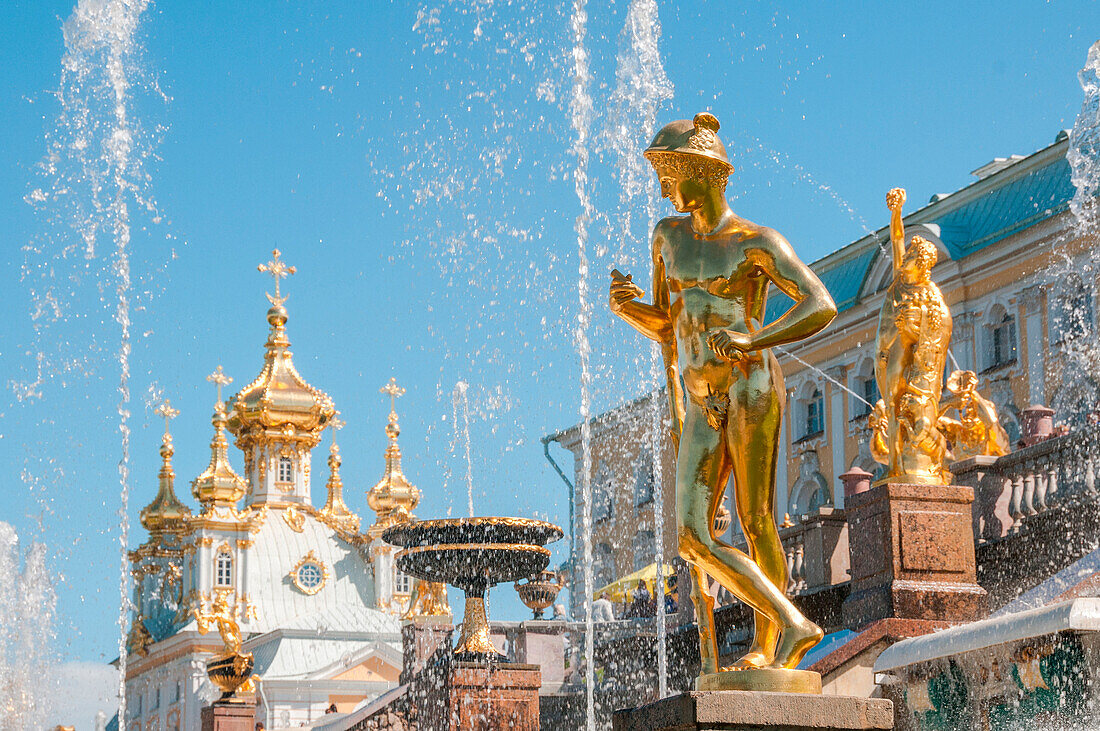 Golden statues of the fountain Grand Cascade of Peterhof, Saint Petersburg, Russia