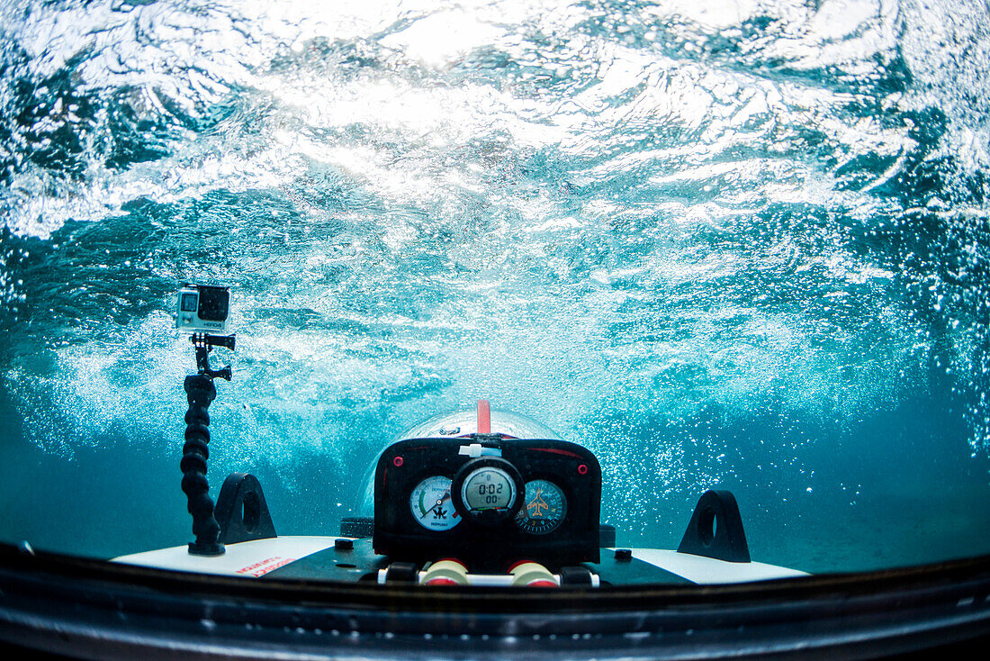 Photograph with underwater view from rear cockpit of personal submarine, Lake Tahoe, California, USA