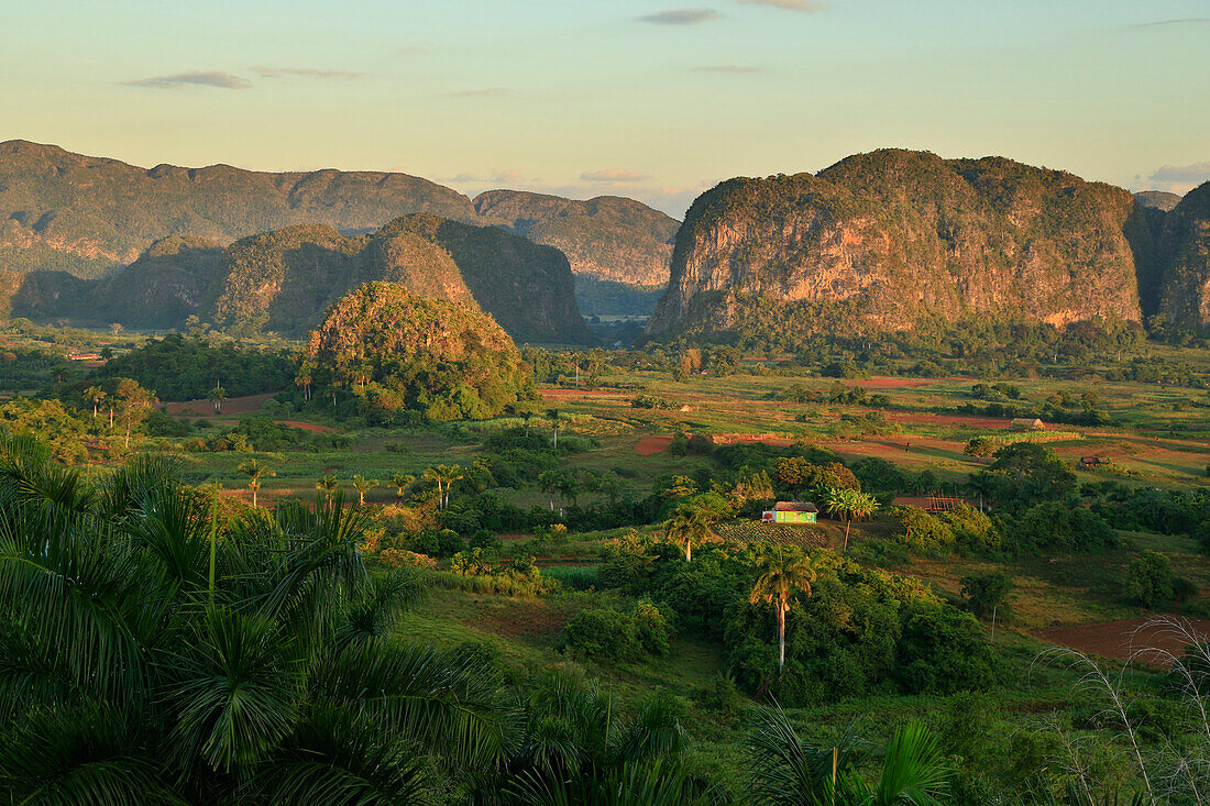 Sunrise over the limestone mogotes formations in the Vinales valley, Cuba