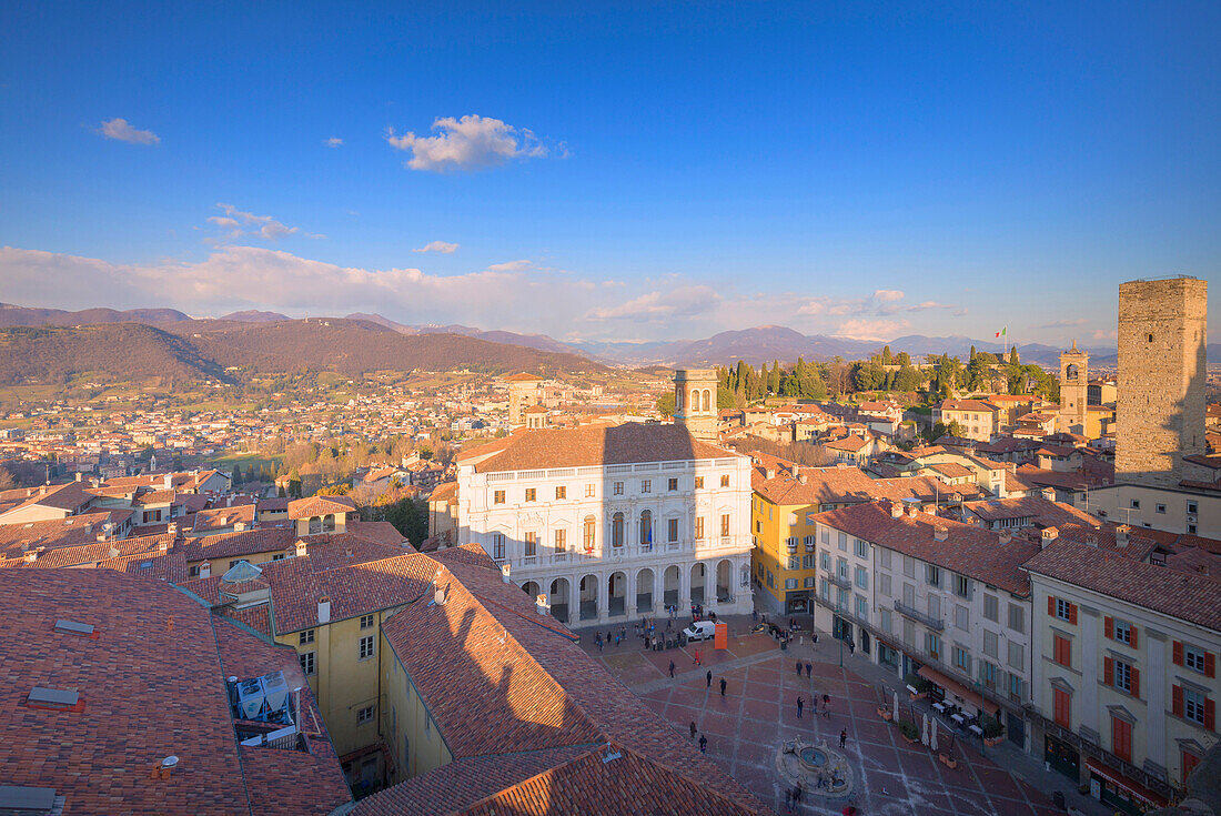 Piazza Vecchia and Palazzo Nuovo (New Palace) from above during sunset. Bergamo, Lombardy, Italy.