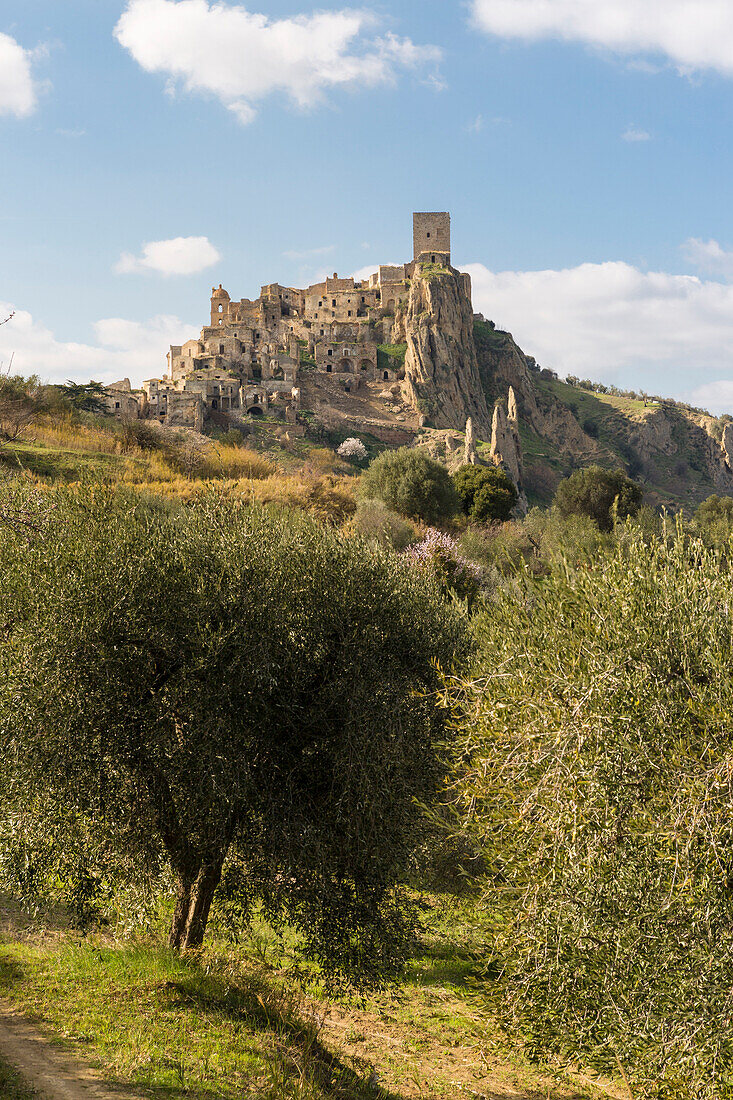 Picturesque view down the hilltop ghost town of Craco, Matera Province, Basilicata, Italy