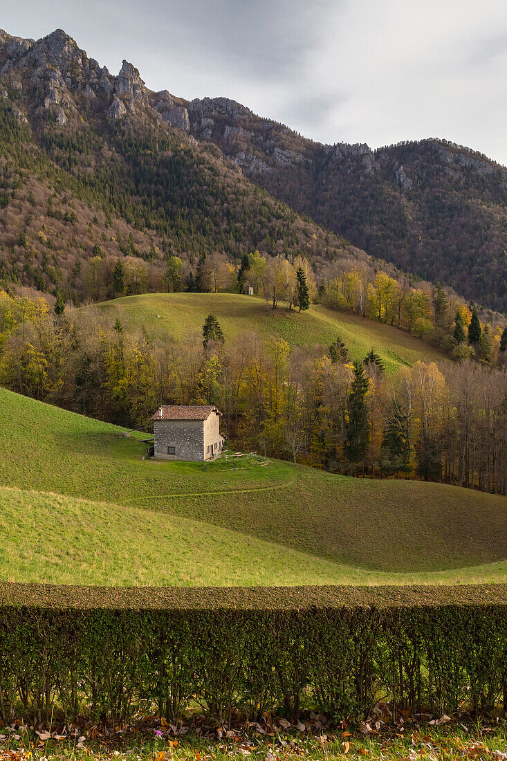 A little house on the slopes of Monte Alben in autumn, Valpiana, Serina, Val Serina, Bergamo district, Lombardy, Italy.