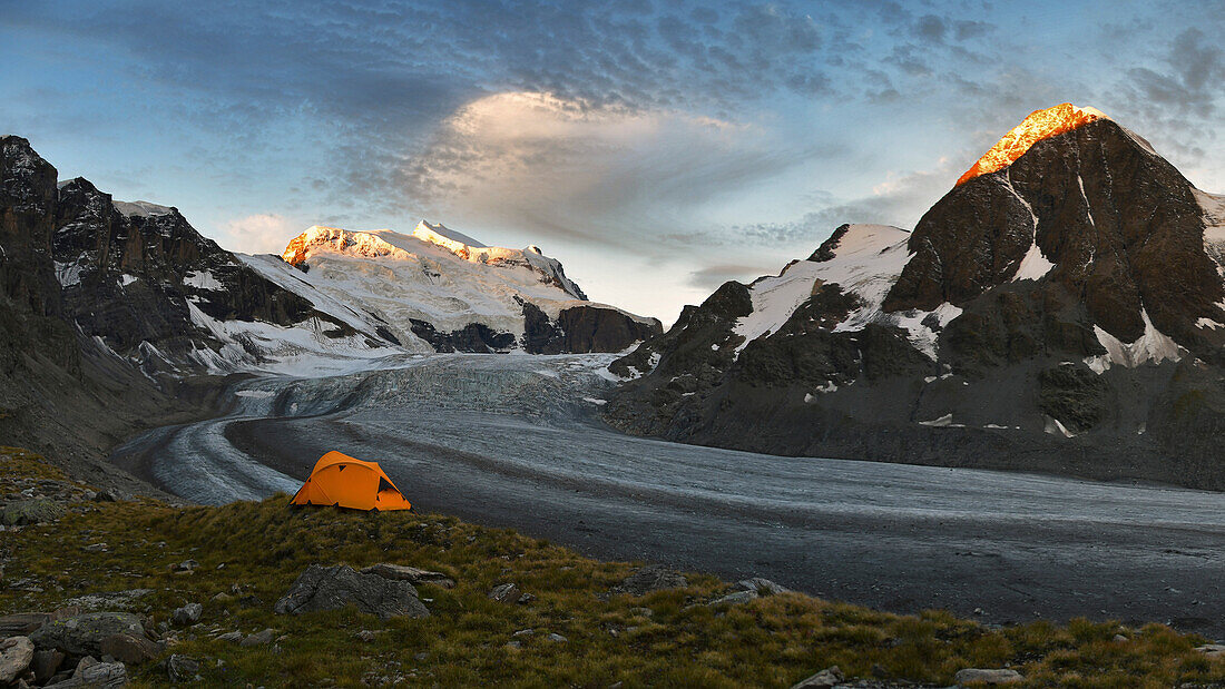 Camping on the ridge of moraine, close to the Grand Combin glacier, Grand Combin on background,Switzerland,Swiss