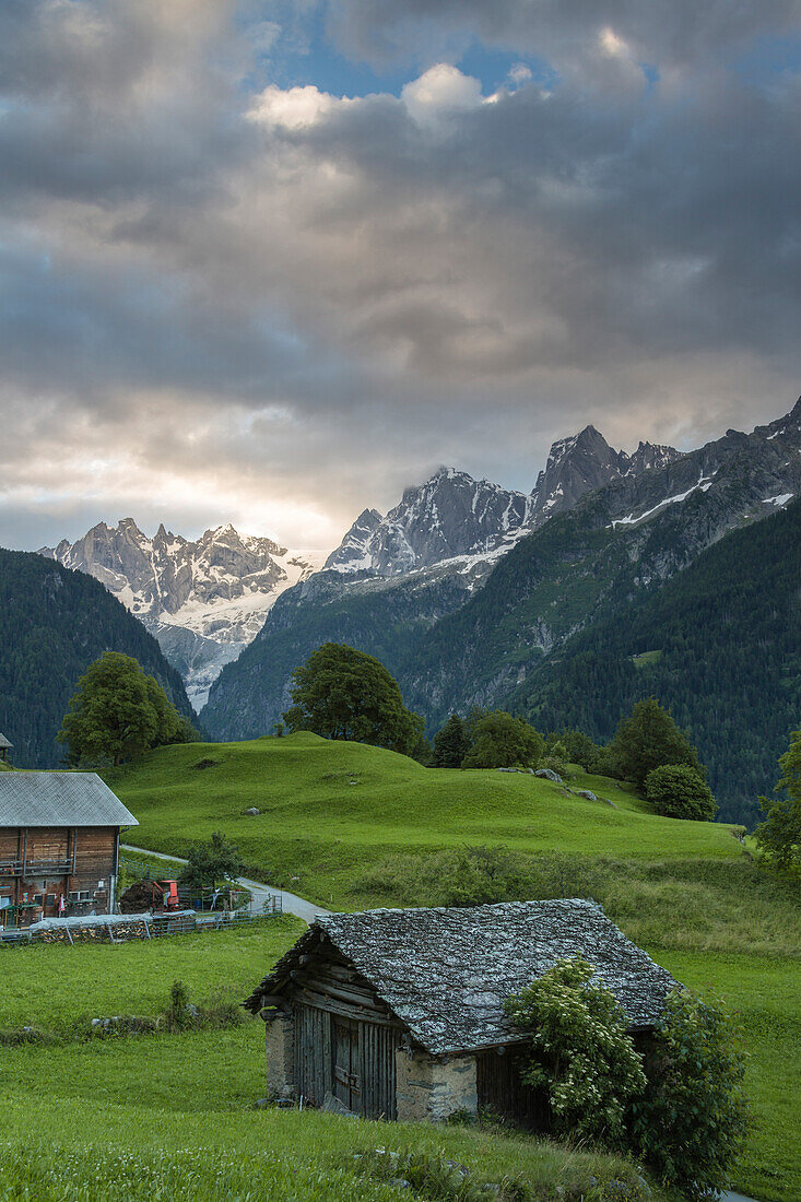 Clouds at dawn, Soglio, Bregaglia Valley, Maloja Region, Canton of Graubunden, Switzerland