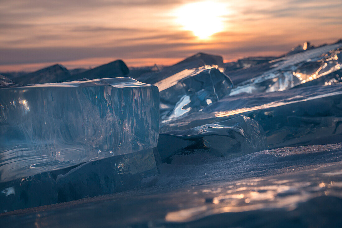 Sun reflections on ice at Lake Baikal, Irkutsk region, Siberia, Russia