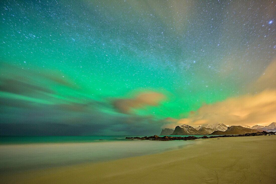 Beach with polar lights and stary sky, northern lights, aurora borealis, Lofoten, Nordland, Norway