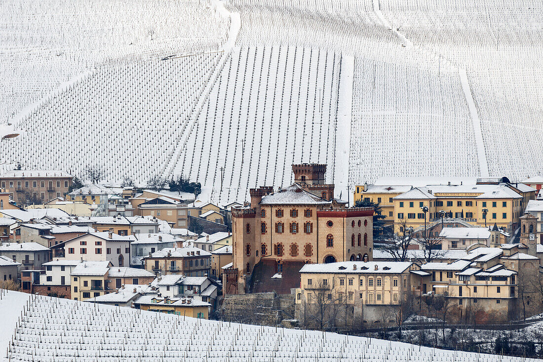 Langhe, Cuneo district, Piedmont, Italy. Langhe wine region winter snow, Barolo castle