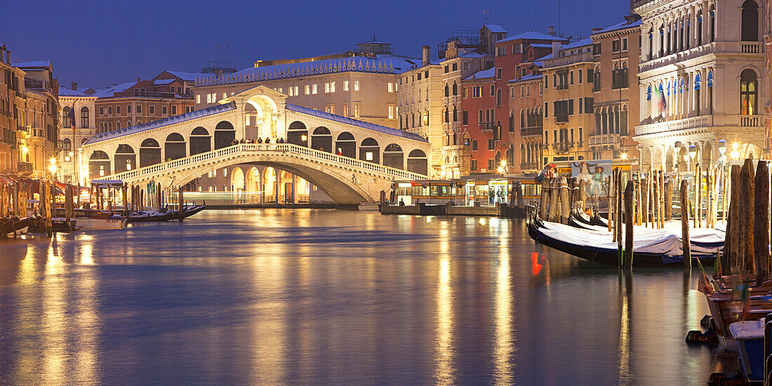 Rialto Bridge at dusk after a snowfall, Grand Canal, Venice, Veneto, Italy