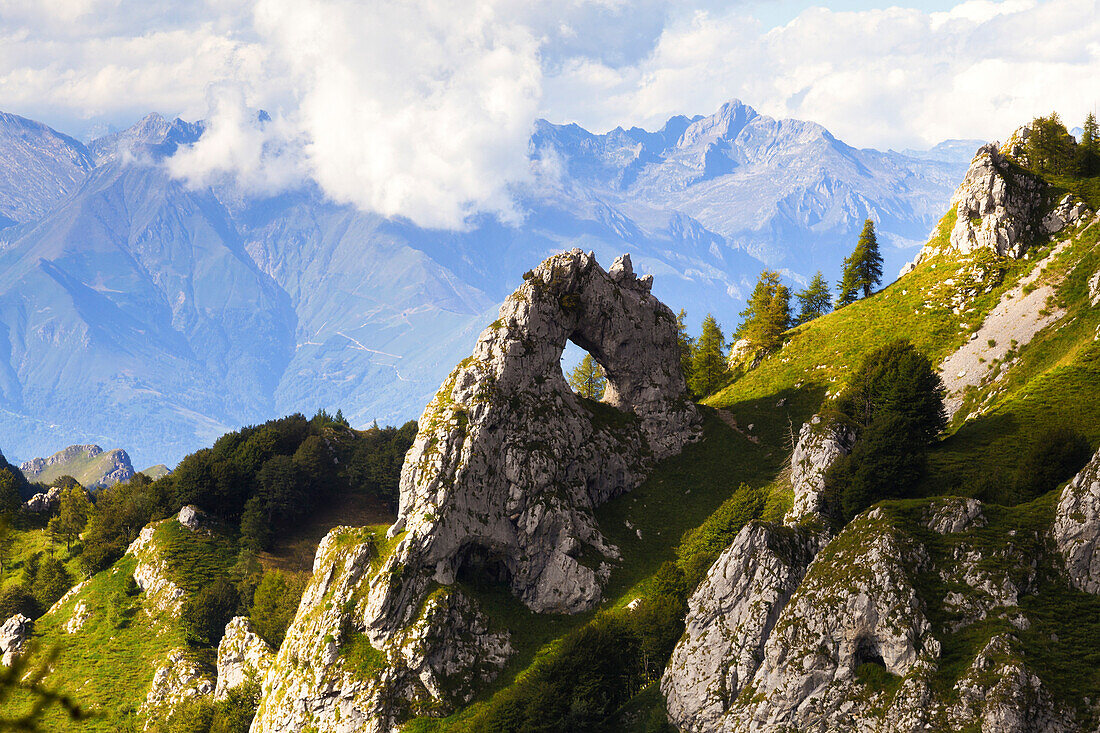 The Porta di Prada, a rock natural arch in the Grigna group. Grigna Settentrionale(Grignone), Northern Grigna Regional Park, Lombardy, Italy, Europe.