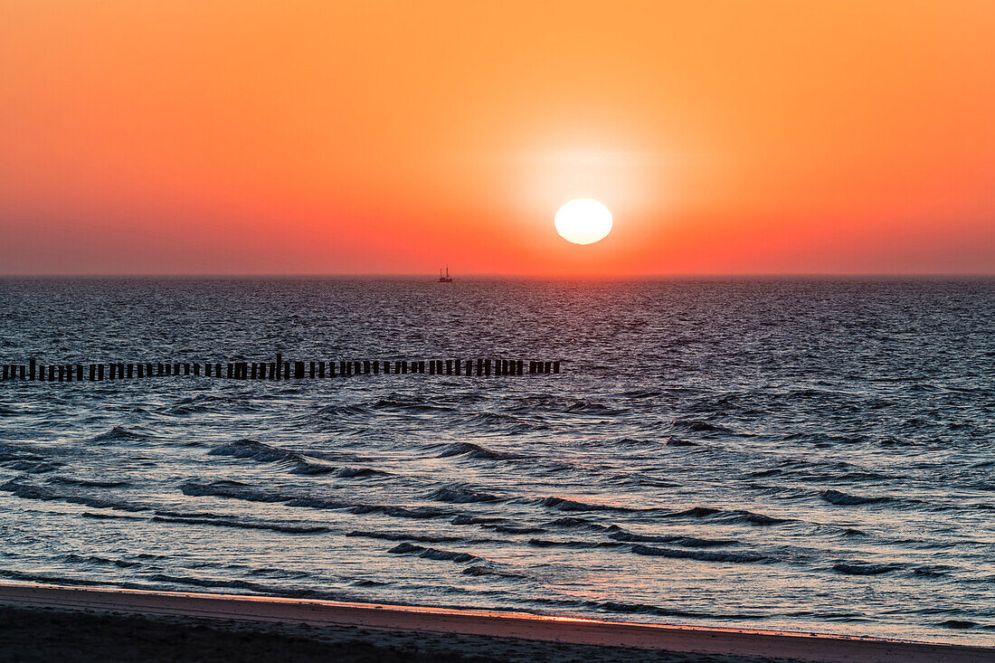 Sunset with fishing boat, Wangerooge, East Frisia, Lower Saxony, Germany