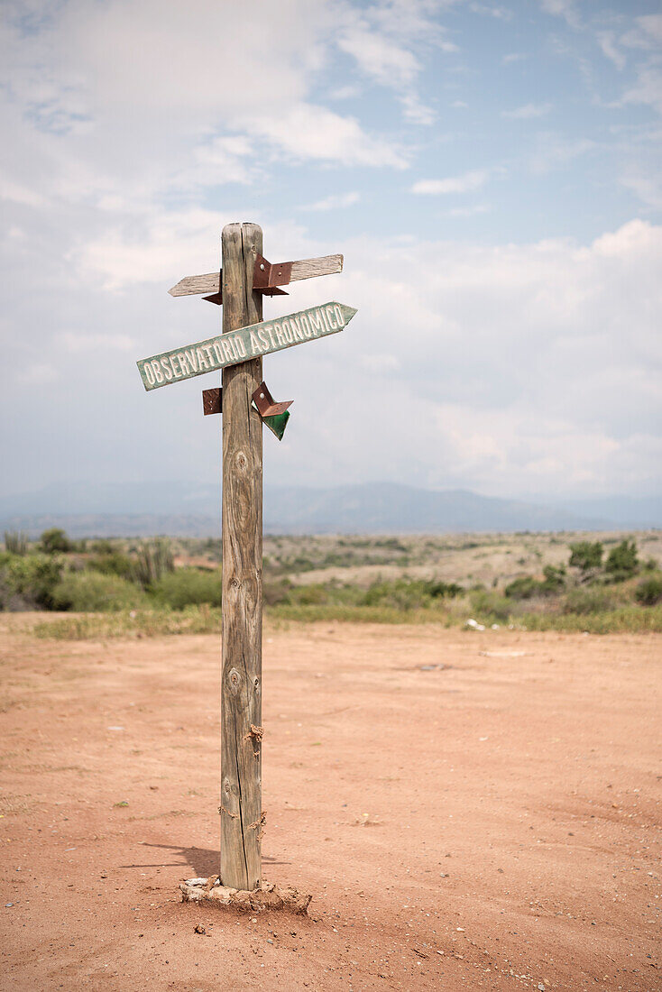 guidepost to observatory, surreal landscape at Tatacoa desert (Desierto de la Tatacoa), township Villavieja nearby Neiva, Departmento Huila, Colombia, Southamerica