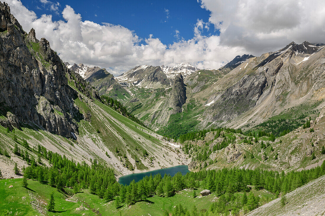 View towards mountain lake and Cottian Alps, Val Maira, Cottian Alps, Piedmont, Italy