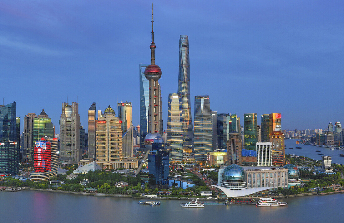 China, Shanghai City, Pudong Skyline,Oriental Pearl, World Financial Center and Shanghai Towers, Huangpu River.