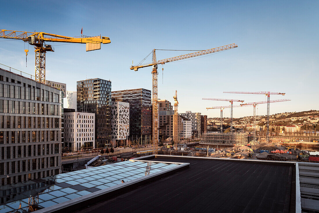 view from rooftop of Opera House at the area named BARCODE, construction site and plenty of tower cranes, Oslo, Norway, Scandinavia, Europe