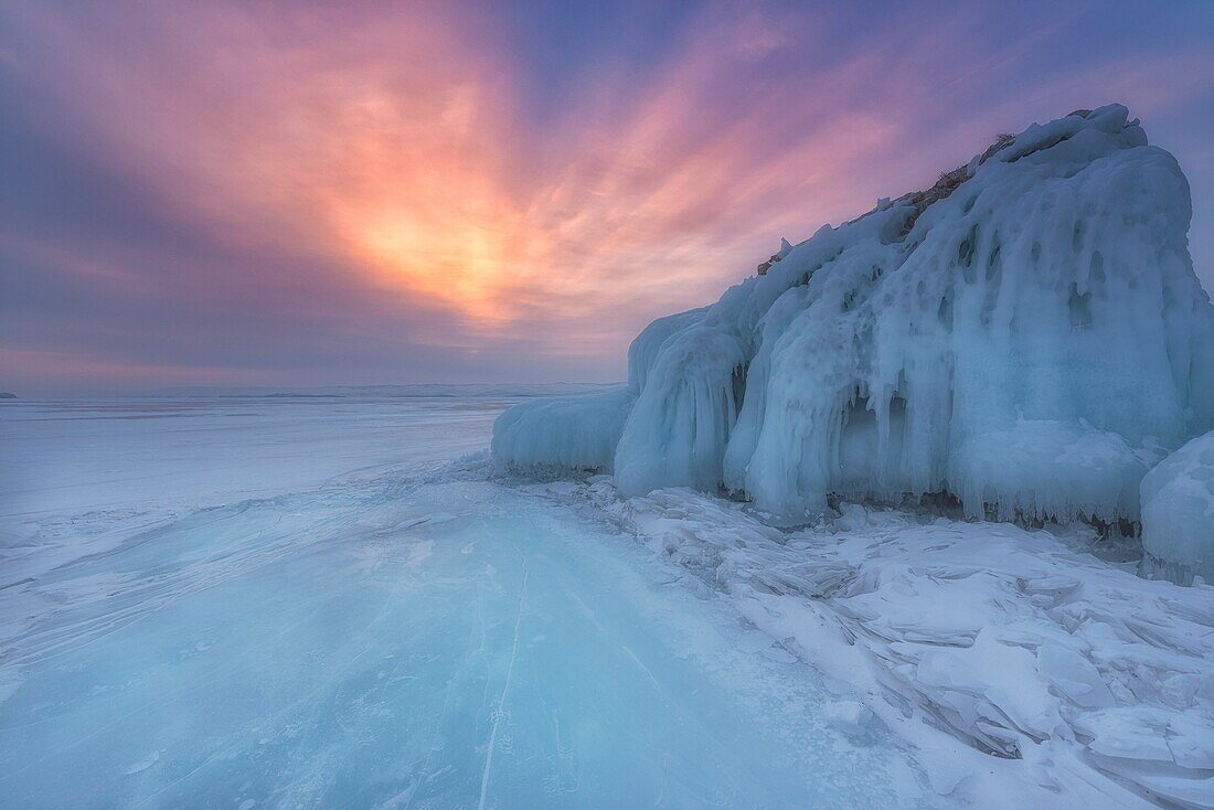 Ice mountain at sunrise at lake Baikal, Irkutsk region, Siberia, Russia.