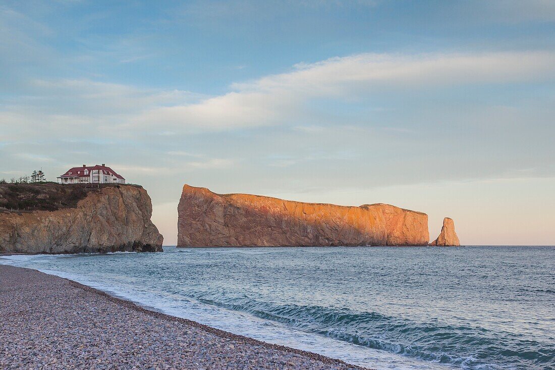 Canada, Quebec, Gaspe Peninsula, Perce, Perce Rock, sunset.