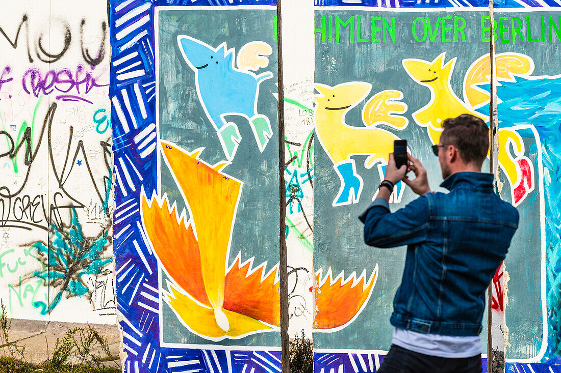 Tourist, East Side Gallery, Berlin Wall, Berlin, Germany