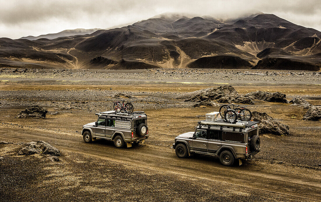 Two offroad vehicels on the way to Askja on a mountain road, Vatnajökul national park, Iceland