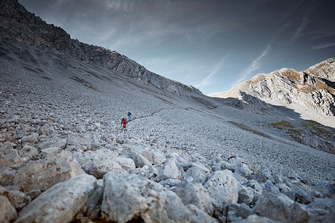 Two Hikers on the way to the top of Daniel Mountain, Daniel mountain, Ammergau Alps, Tyrol, Austria