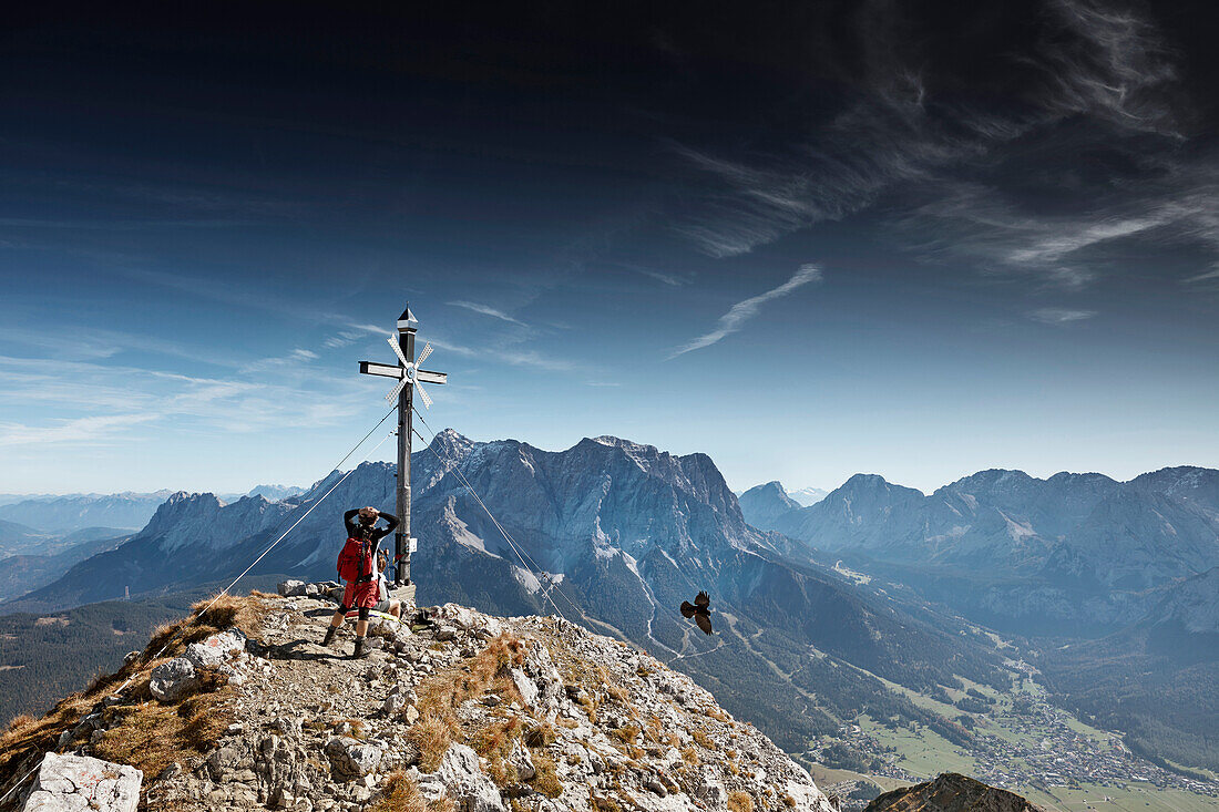 Hikers on  the top of Daniel Mountain, Daniel mountain, Ammergau Alps, Tyrol, Austria