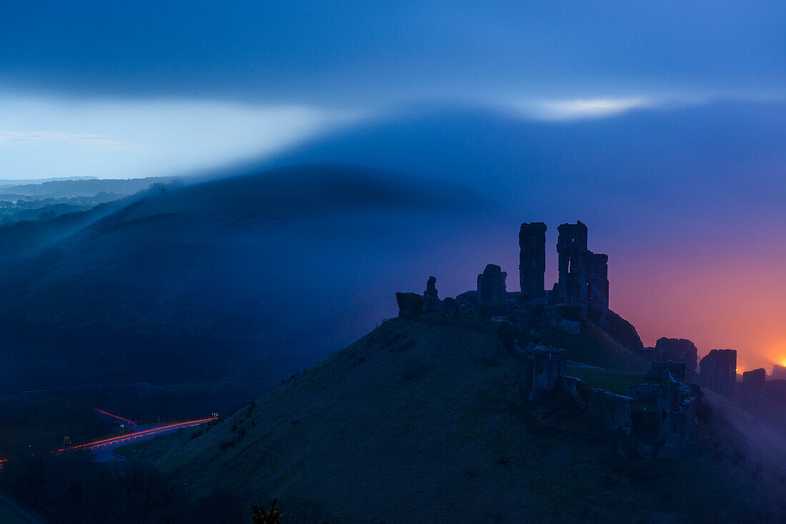 Corfe Castle early morning in dense fog, Dorset, England