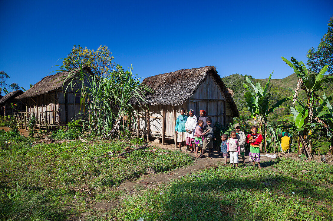 local people and typical houses in the highlands of Madagascar, Africa