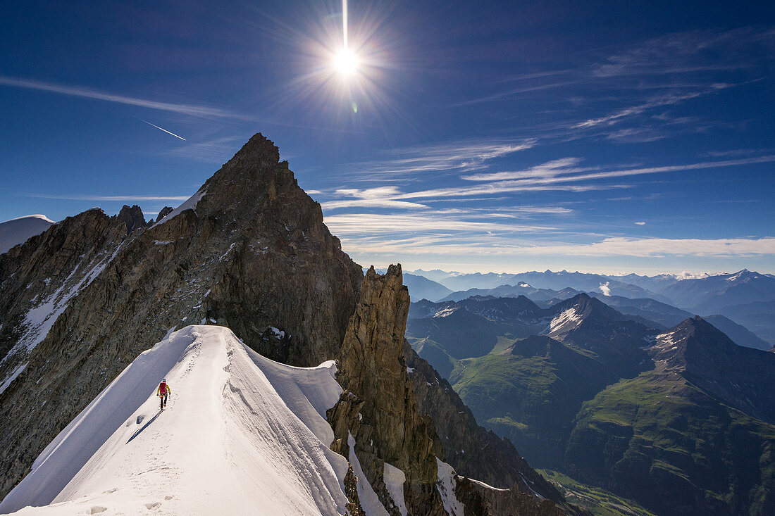 Climber on a ridge at Dome de Rochefort, Grandes Jorasses, Mont Blanc group, France