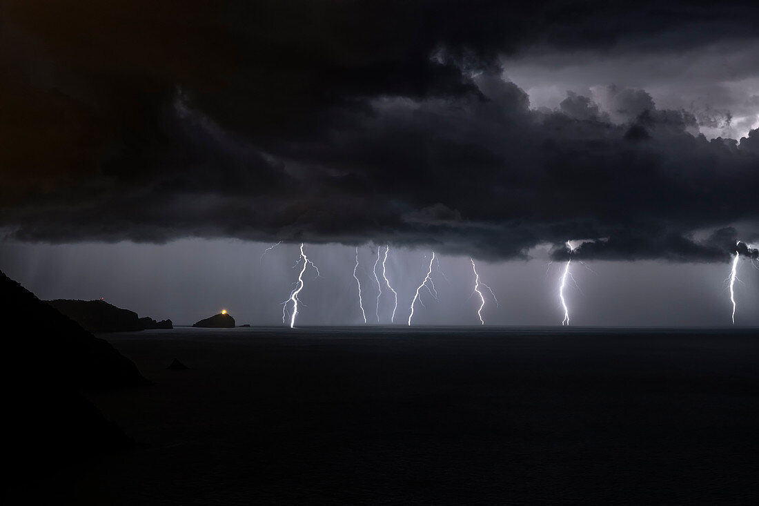 lightning on Tino Island on summer night, municipality of Porto Venere, La Spezia province, Liguria district, Italy, Europe