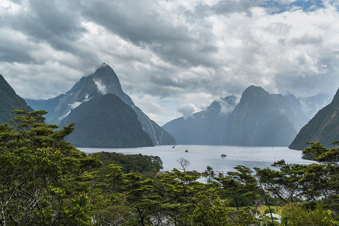 Elevated view of Milford Sound on a cloudy summer day. Fiordland NP, Southland district, Southland region, South Island, New Zealand.