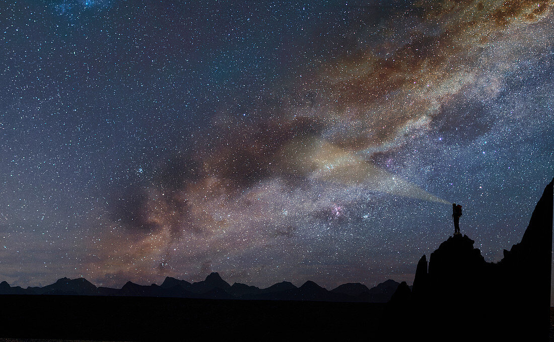 Silhouette of rocks under starscape in the Dolomites, South Tyrol, Italy