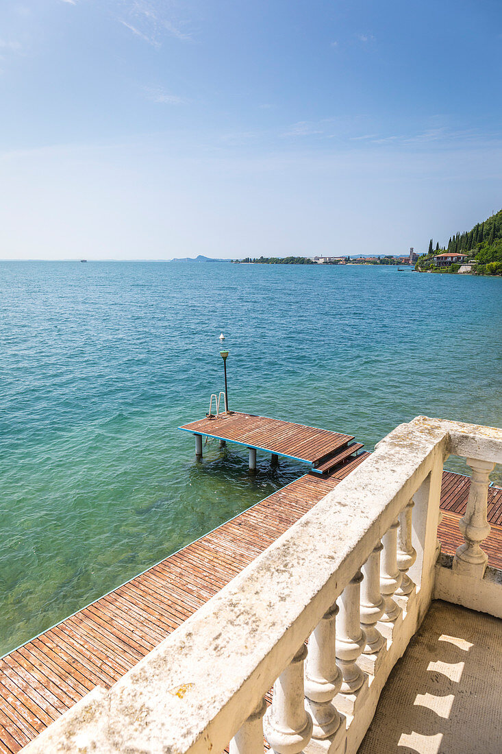 sunny day on Garda Lake, view from a balcony. Toscolano Maderno, Brescia district, Lombardia, Italy