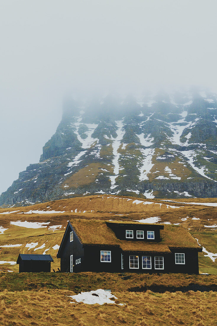 Iconic wooden house with grass roof, Gasadalur, Vagar island, Faroe Islands, Denmark