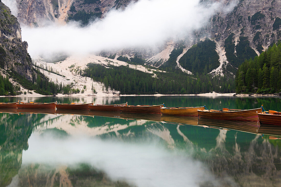 Boats at Braies Lake / Pragser Wildsee, Braies / Prags, Dolomites, South Tyrol, Italy, Europe.