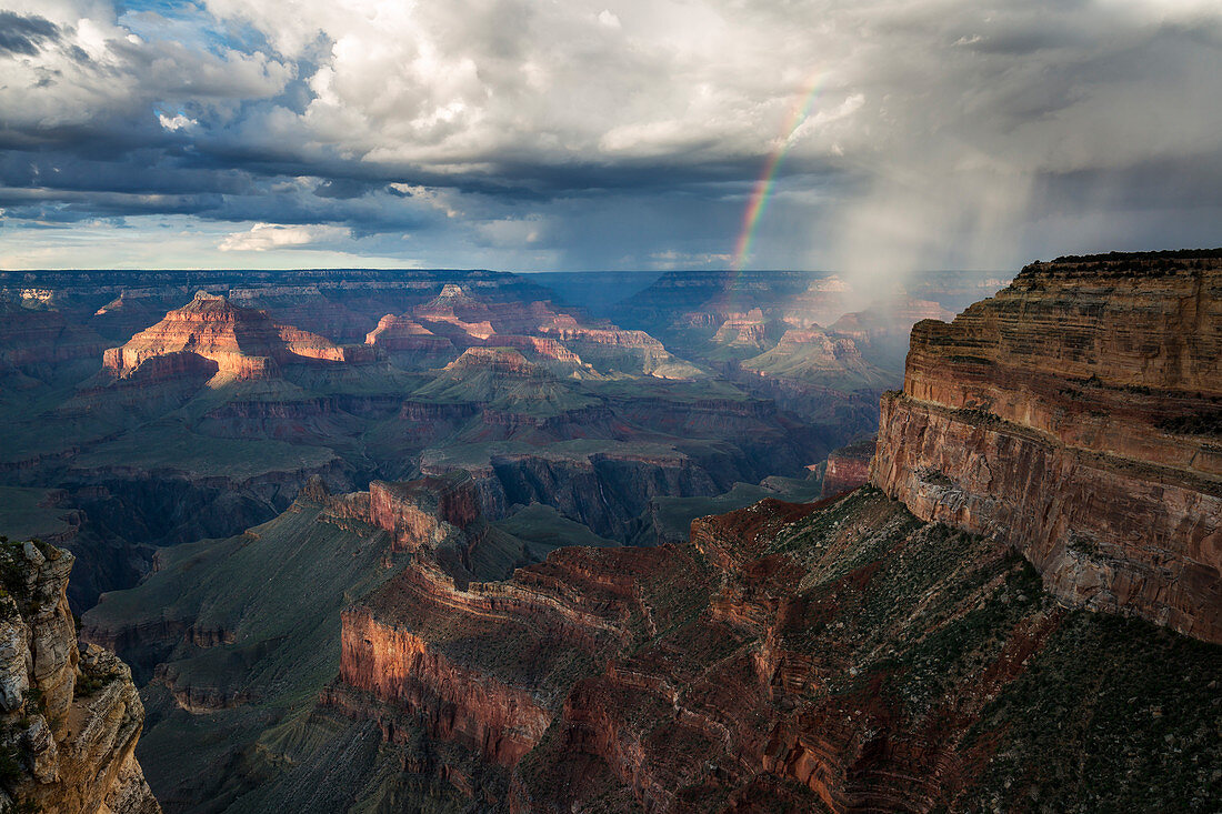 Rainbow and rain at Grand Canyon National Park, South Rim, Mohave Point, Arizona, North America, USA