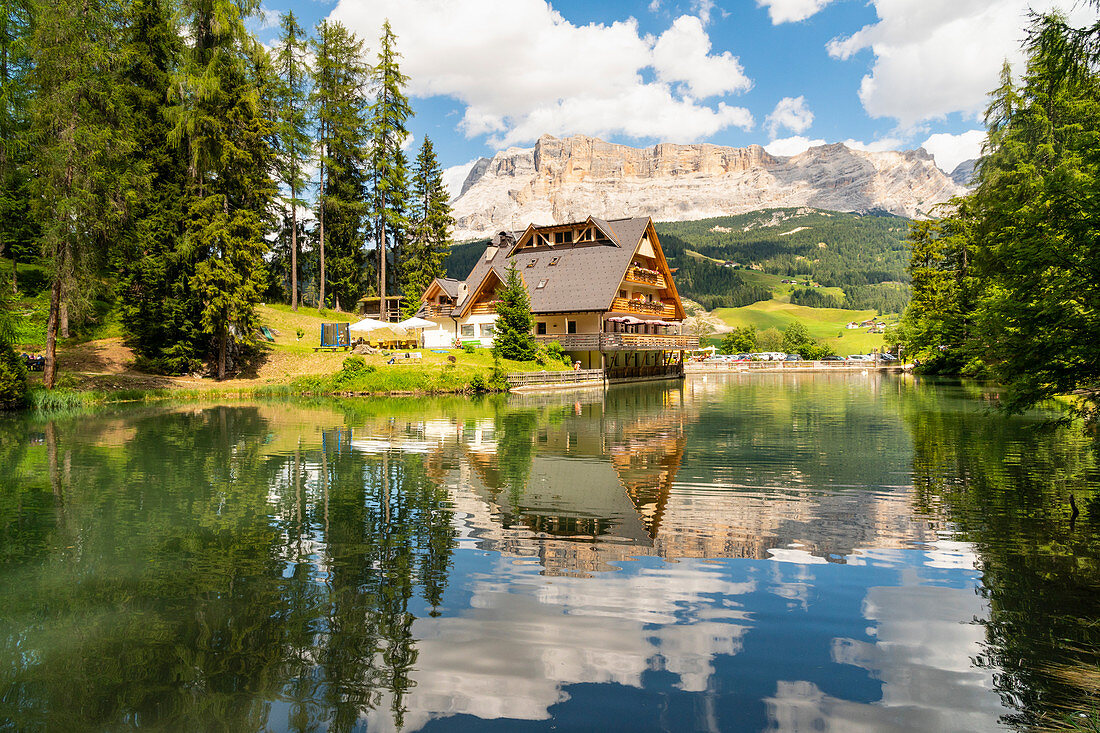 Reflections at Sompunt lake. La Villa, Badia valley, Bolzano, Trentino Alto Adige, Italy