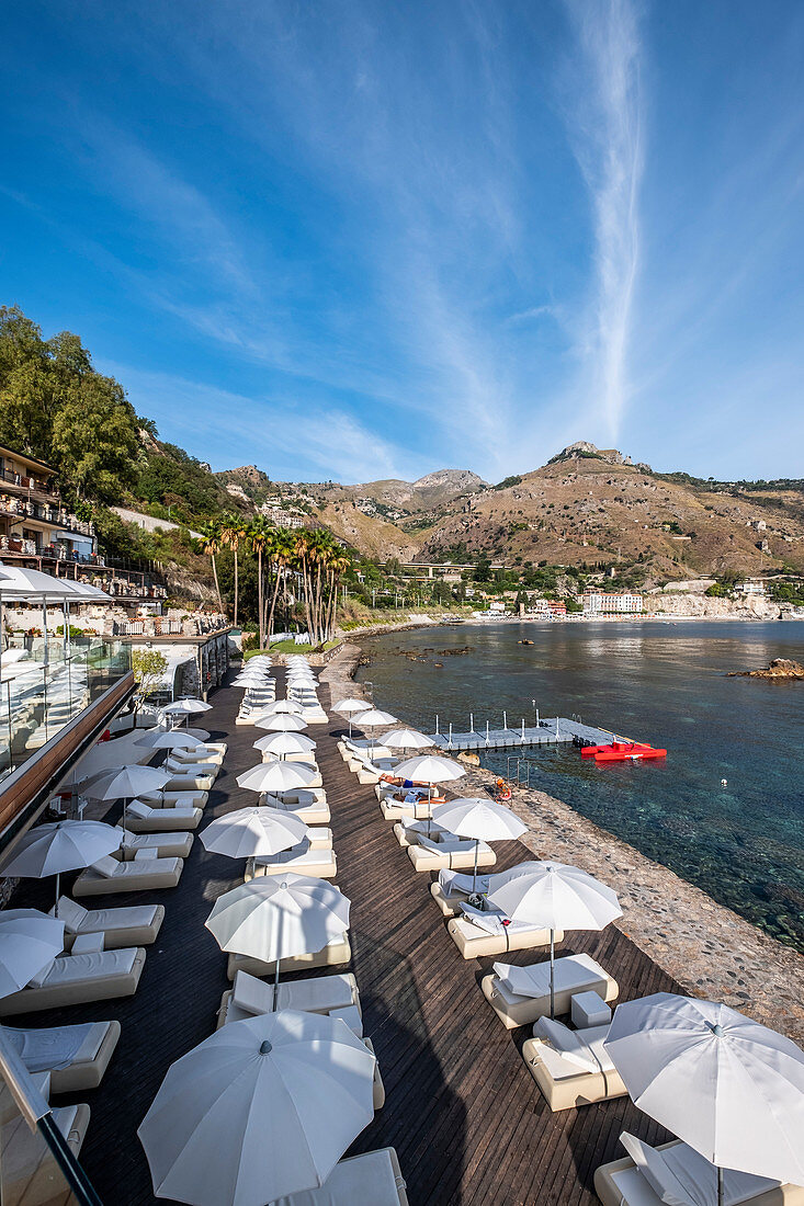 Beach club and pool of the Grand Hotel Atlantis in Taormina Mare, Sicily, South Italy, Italy