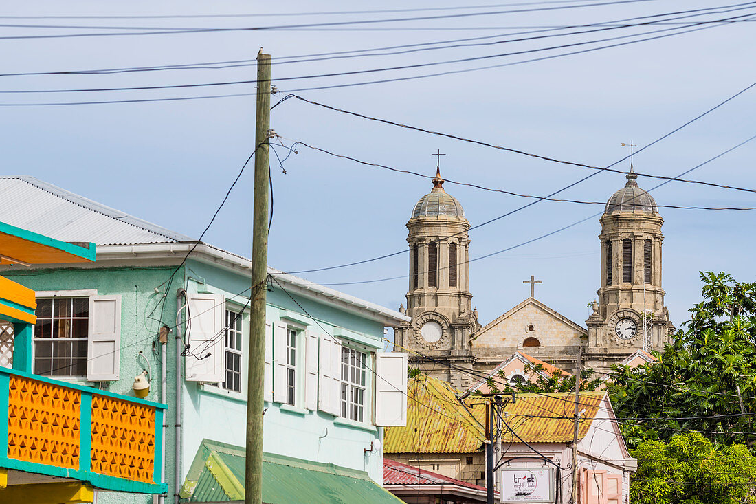 Street with old houses and the St. John's Cathedral , Saint John´s, Antigua and Barbuda, Caribbean, Lesser Antilles