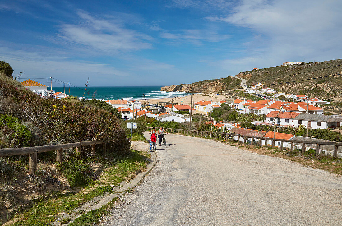 Steep coast and beach of Monte Clérigo, Atlantic Ocean, Parque Natural do Sudoeste Alentejano e Costa Vicentina, Southwest Alentejo and Vicentine Coast Natural Park, District Faro, Region of Algarve, Portugal, Europe